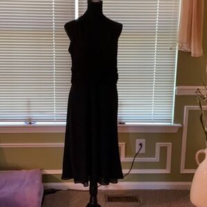 Black cocktail dress. Never worn. Size 6.